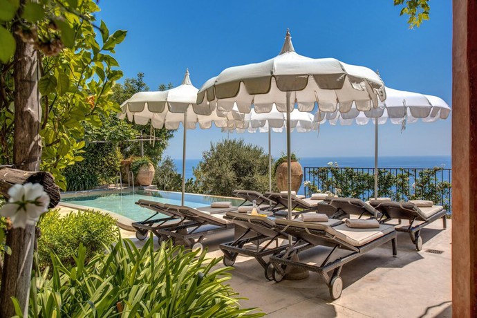 Imagen de la habitación del Villa Angelina in Positano. Foto 11