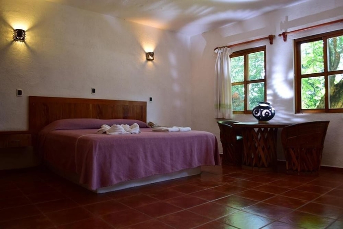 Imagen de la habitación del Villa Blanca Suites. Foto 3