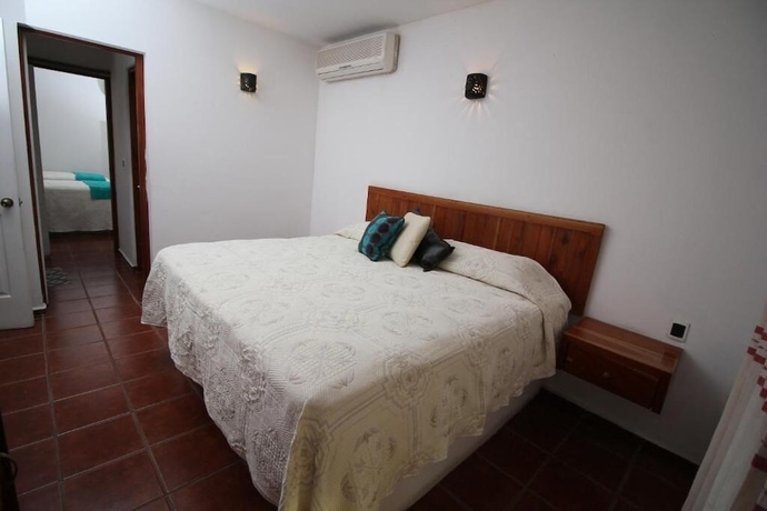 Imagen de la habitación del Villa Blanca Suites. Foto 5
