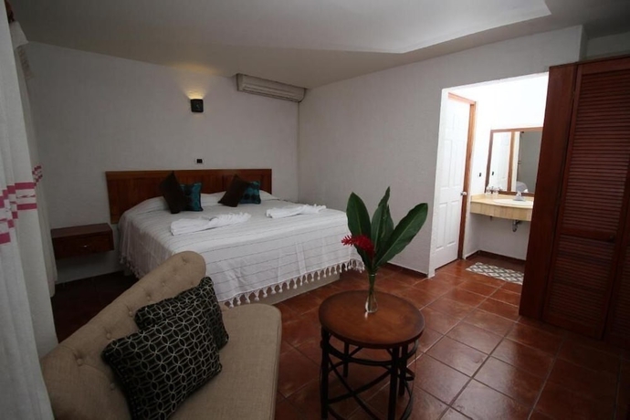 Imagen de la habitación del Villa Blanca Suites. Foto 7