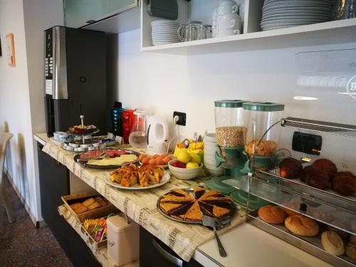 Imagen del bar/restaurante del Villa Cameras Room And Breakfast. Foto 6