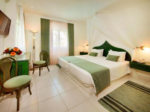 Imagen de la habitación del Villa Esmeralda. Foto 9