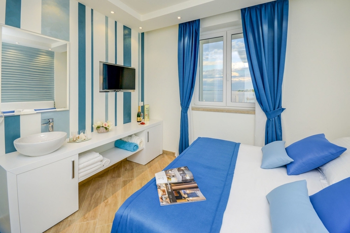 Imagen de la habitación del Villa Garuti & Apartment. Foto 8
