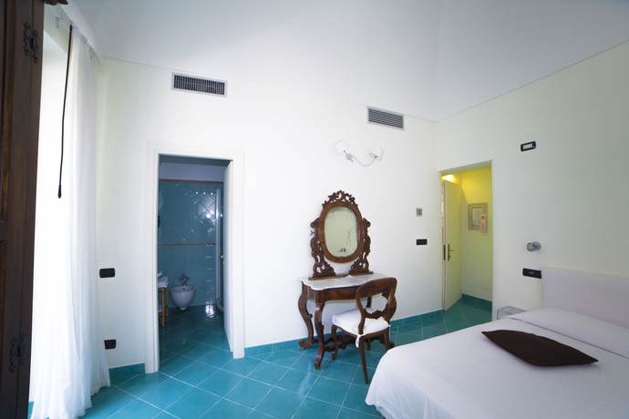 Imagen de la habitación del Villa Lara Hotel. Foto 2