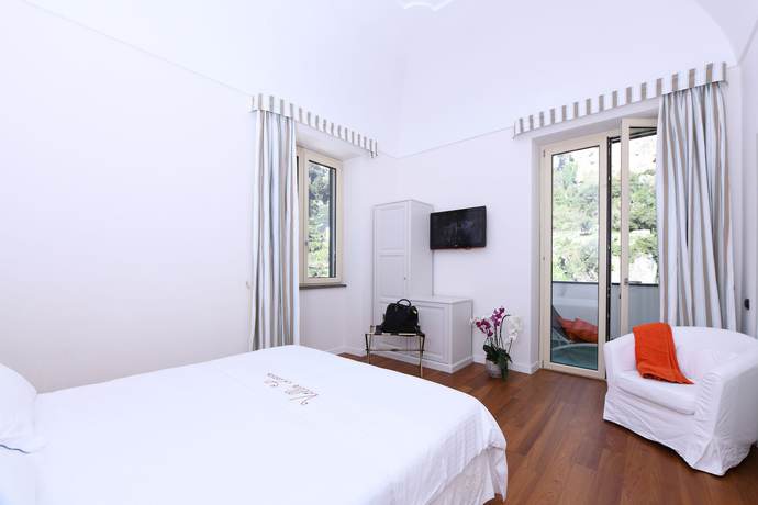 Imagen de la habitación del Villa Lara Hotel. Foto 10