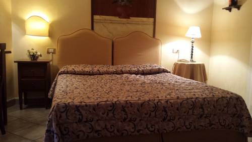 Imagen de la habitación del Villa Le Camelie Siena. Foto 4