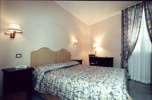 Imagen de la habitación del Villa Le Camelie Siena. Foto 10