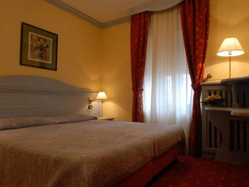 Imagen de la habitación del Villa Le Camelie Siena. Foto 13