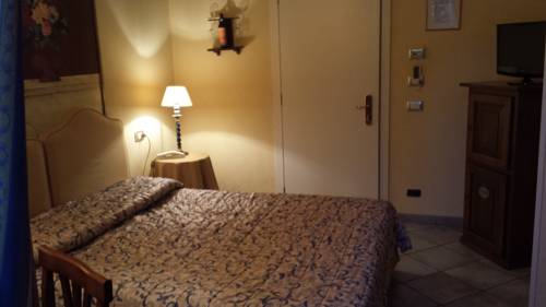 Imagen de la habitación del Villa Le Camelie Siena. Foto 15