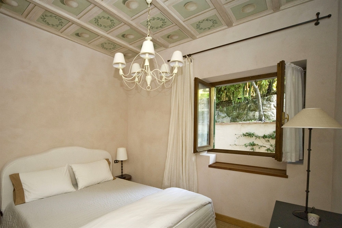 Imagen de la habitación del Villa Magnolia Relais. Foto 1