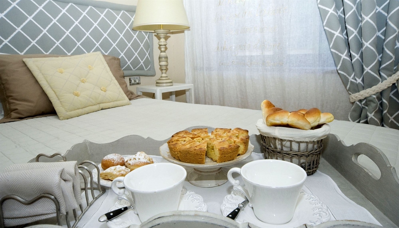 Imagen de la habitación del Villa Magnolia Relais. Foto 11