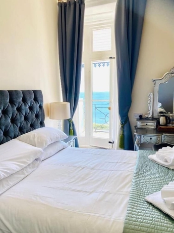 Imagen de la habitación del Villa Mentone Hotel. Foto 6