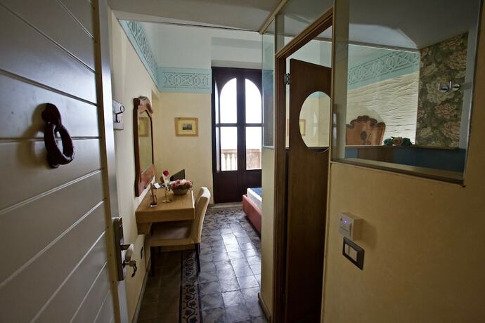 Imagen de la habitación del Villa Musolino Country Resort. Foto 18