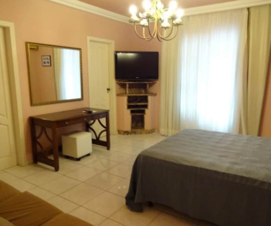 Imagen de la habitación del Villa Norma Suites. Foto 23