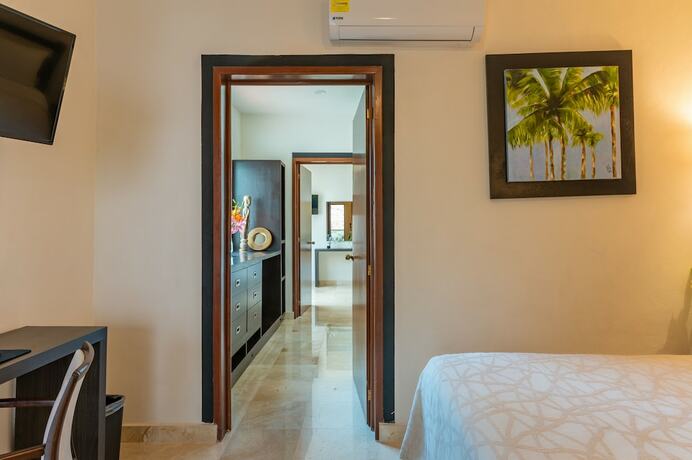 Imagen de la habitación del Villa Palmeras. Foto 13