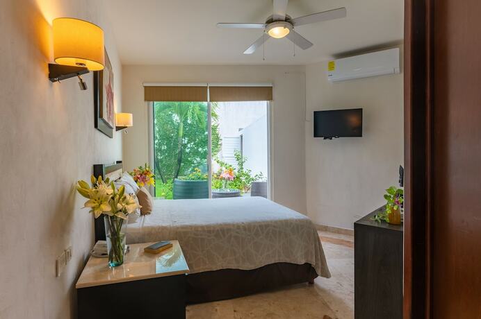 Imagen de la habitación del Villa Palmeras. Foto 19