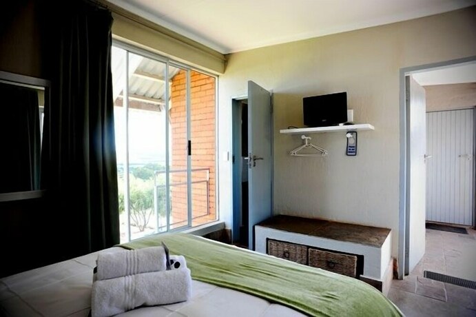 Imagen de la habitación del Villa Paradiso Country Manor. Foto 30