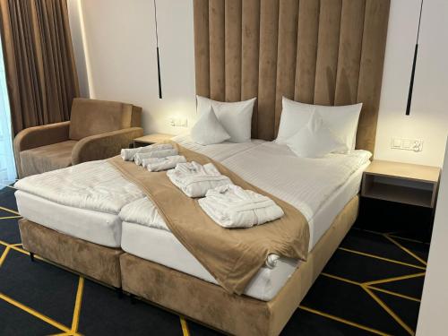 Imagen de la habitación del Villa Posh All Suites Hotel. Foto 17