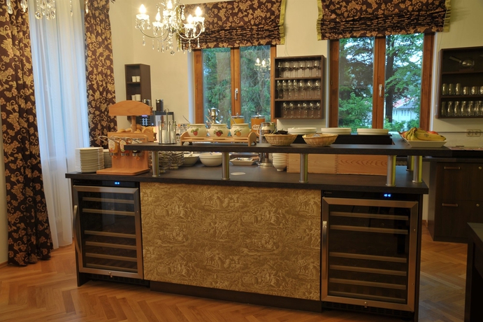 Imagen del bar/restaurante del Villa Toscana. Foto 7