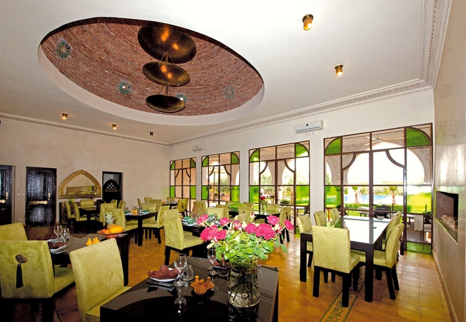 Imagen del bar/restaurante del Villa y Tente Manzil La Tortue. Foto 3
