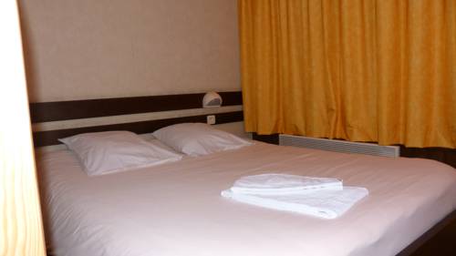 Imagen de la habitación del Village Vacances Le Mongade By Popinns. Foto 13