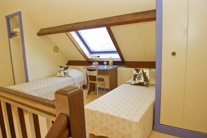 Imagen de la habitación del Village de vacances Le S&eacute;n&eacute;quet. Foto 3