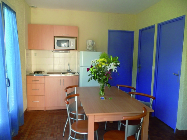 Imagen de la habitación del Village de vacances Le S&eacute;n&eacute;quet. Foto 12