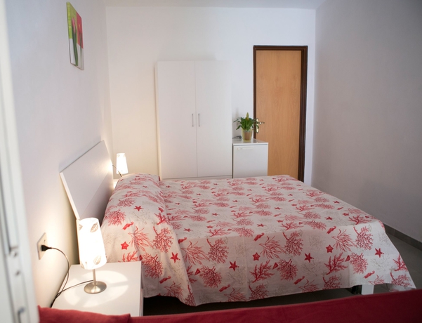 Imagen de la habitación del Villaggio Borgo Marino. Foto 16
