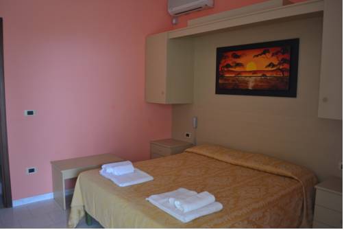 Imagen de la habitación del Villaggio Calispera. Foto 9