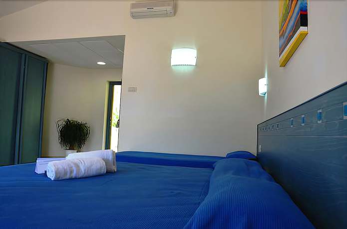 Imagen de la habitación del Villaggio Club Baia Di Dino. Foto 6