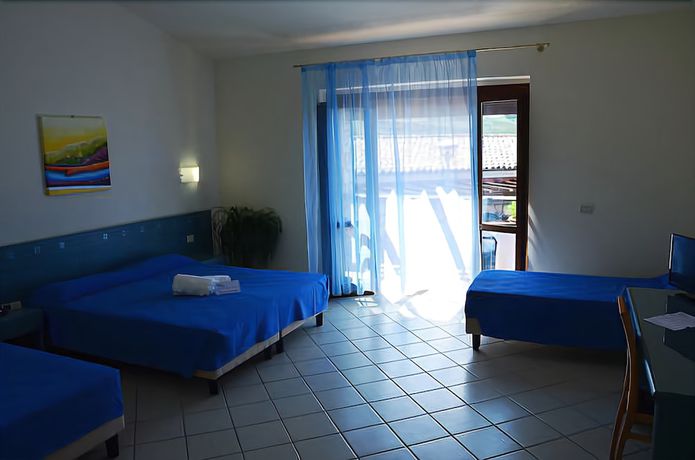 Imagen de la habitación del Villaggio Club Baia Di Dino. Foto 7