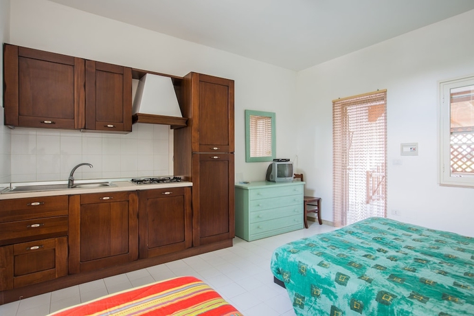 Imagen de la habitación del Villaggio Club Degli Ulivi. Foto 2
