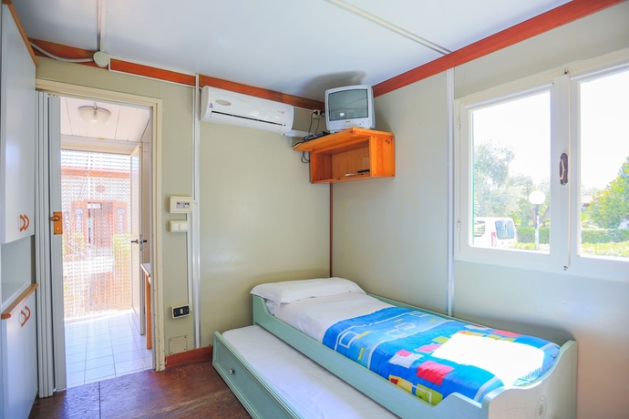Imagen de la habitación del Villaggio Club Degli Ulivi. Foto 4