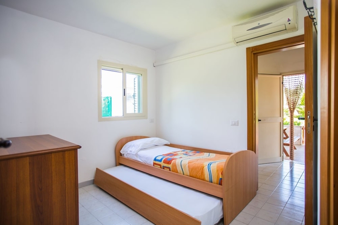 Imagen de la habitación del Villaggio Club Degli Ulivi. Foto 7