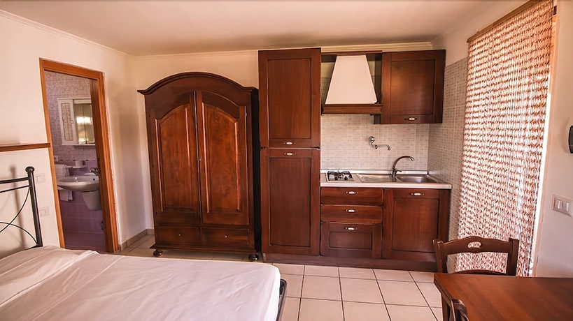 Imagen de la habitación del Villaggio Club Degli Ulivi. Foto 12