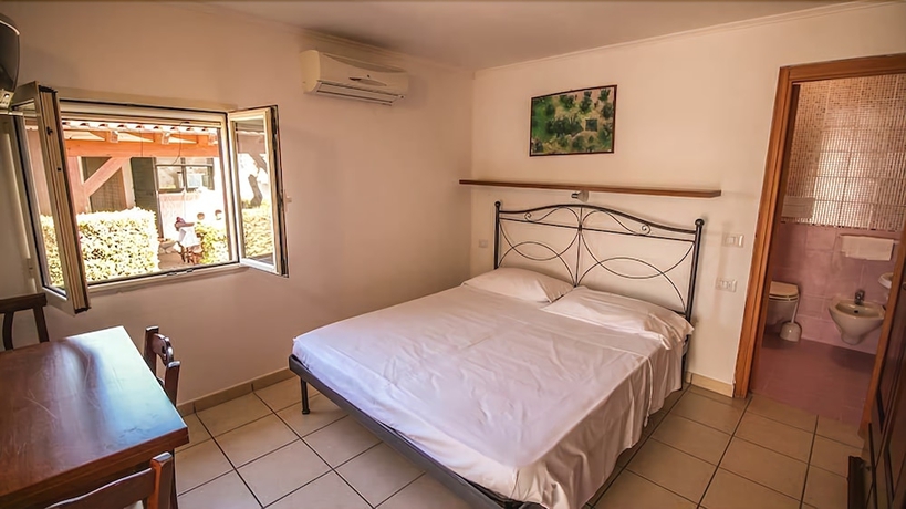 Imagen de la habitación del Villaggio Club Degli Ulivi. Foto 13