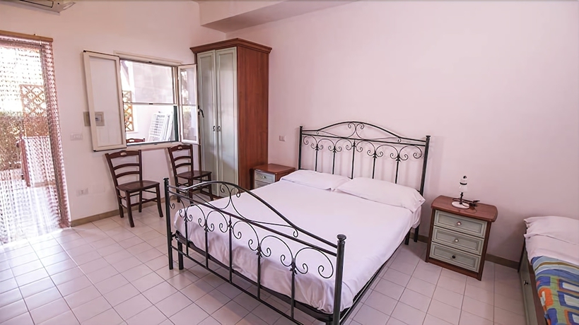 Imagen de la habitación del Villaggio Club Degli Ulivi. Foto 16