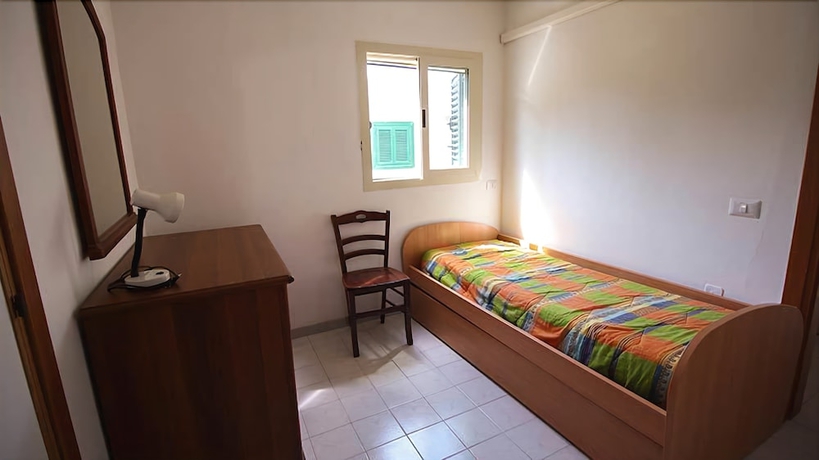 Imagen de la habitación del Villaggio Club Degli Ulivi. Foto 17