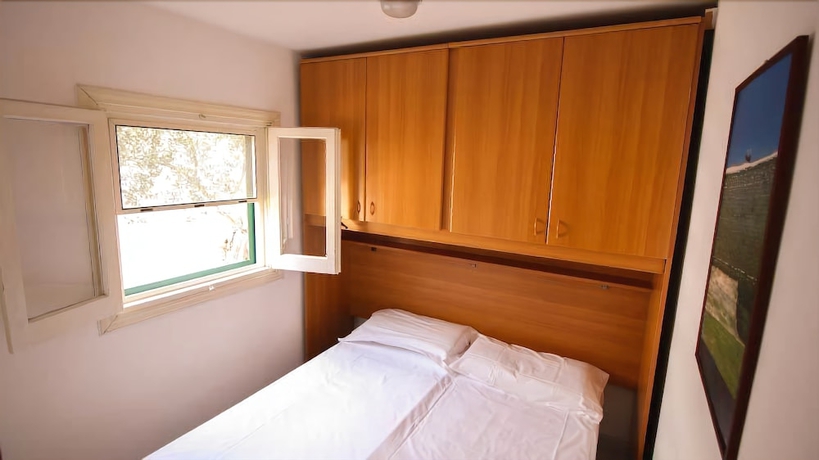 Imagen de la habitación del Villaggio Club Degli Ulivi. Foto 19