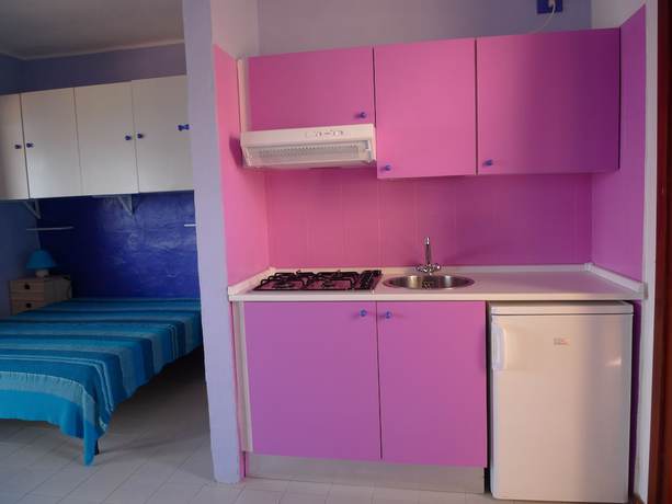 Imagen de la habitación del Villaggio Est. Foto 16