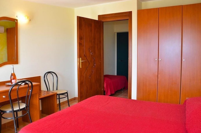 Imagen de la habitación del Villaggio Faro Punta Stilo. Foto 12