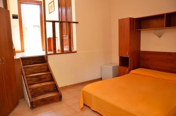 Imagen de la habitación del Villaggio Faro Punta Stilo. Foto 14