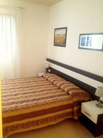 Imagen de la habitación del Villaggio Hemingway - Aparthotel. Foto 16