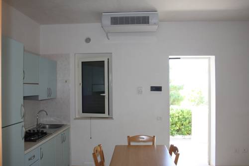 Imagen de la habitación del Villaggio La Giara. Foto 15