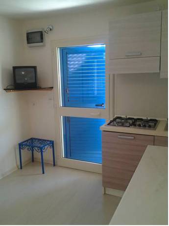 Imagen de la habitación del Villaggio Le Orchidee. Foto 5