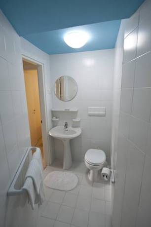 Imagen de la habitación del Villaggio Le Orchidee. Foto 8