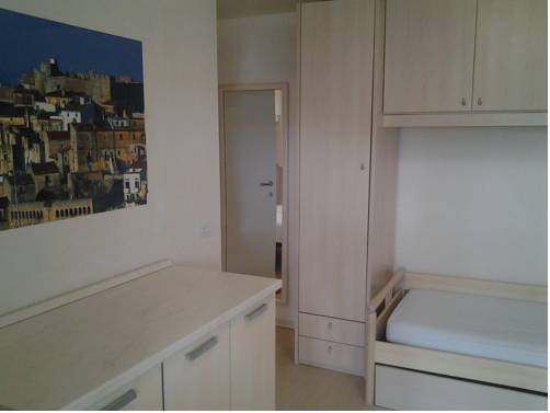 Imagen de la habitación del Villaggio Le Orchidee. Foto 9