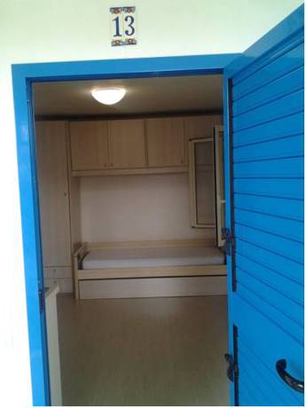 Imagen de la habitación del Villaggio Le Orchidee. Foto 10