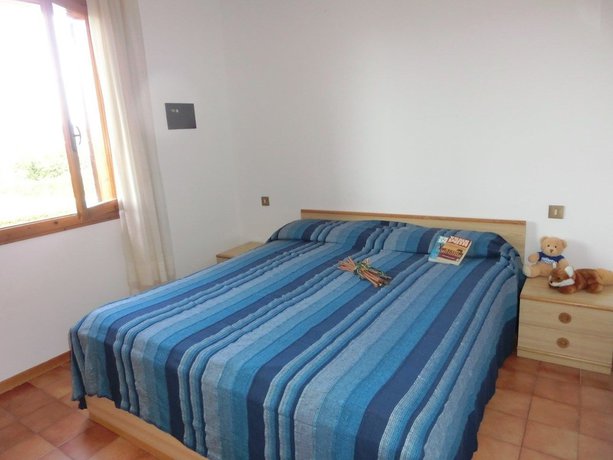 Imagen de la habitación del Villaggio Loriana. Foto 5