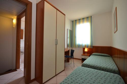Imagen de la habitación del Villaggio Marco Polo, Bibione. Foto 8